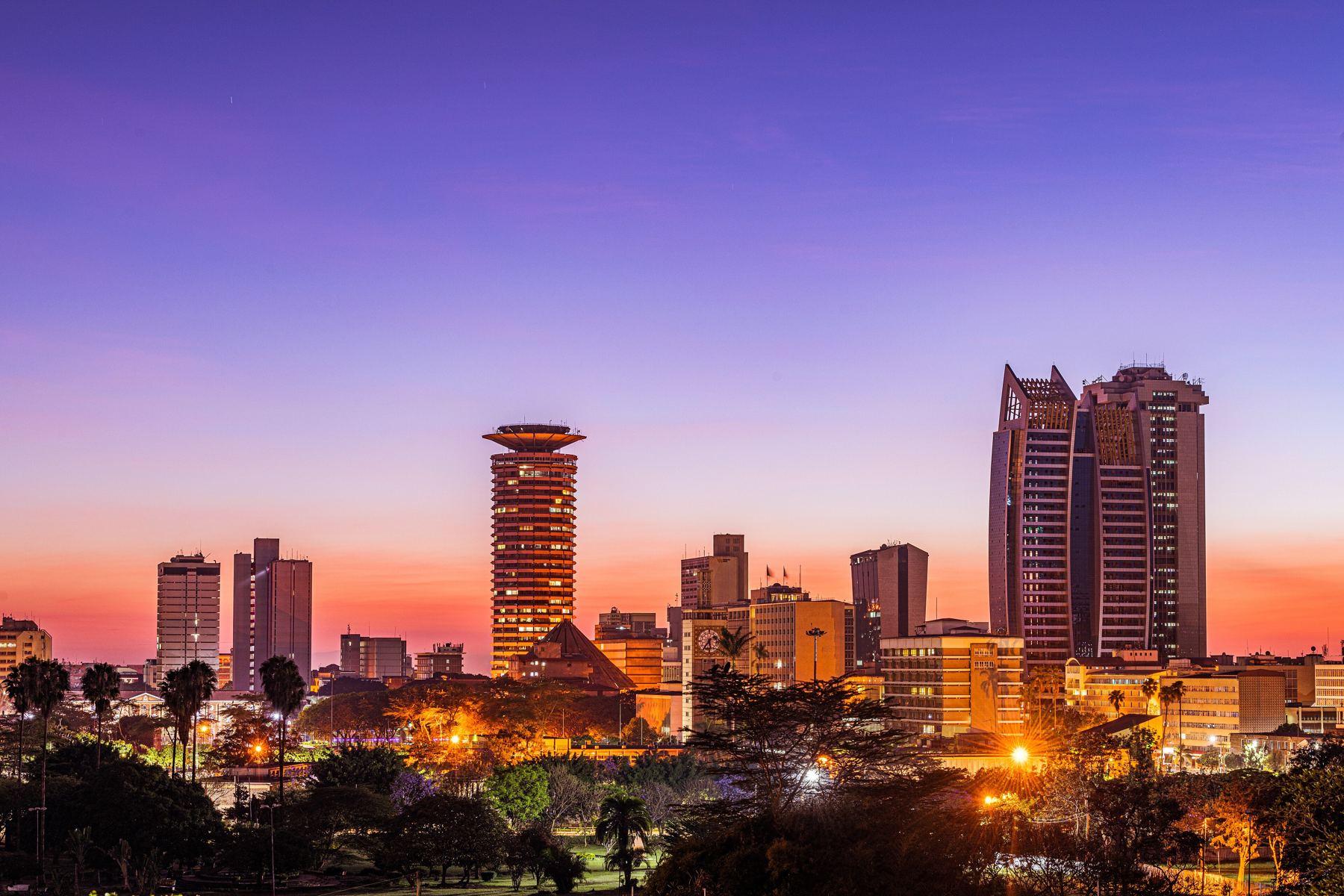 Nairobi's city skyline lit up at dusk