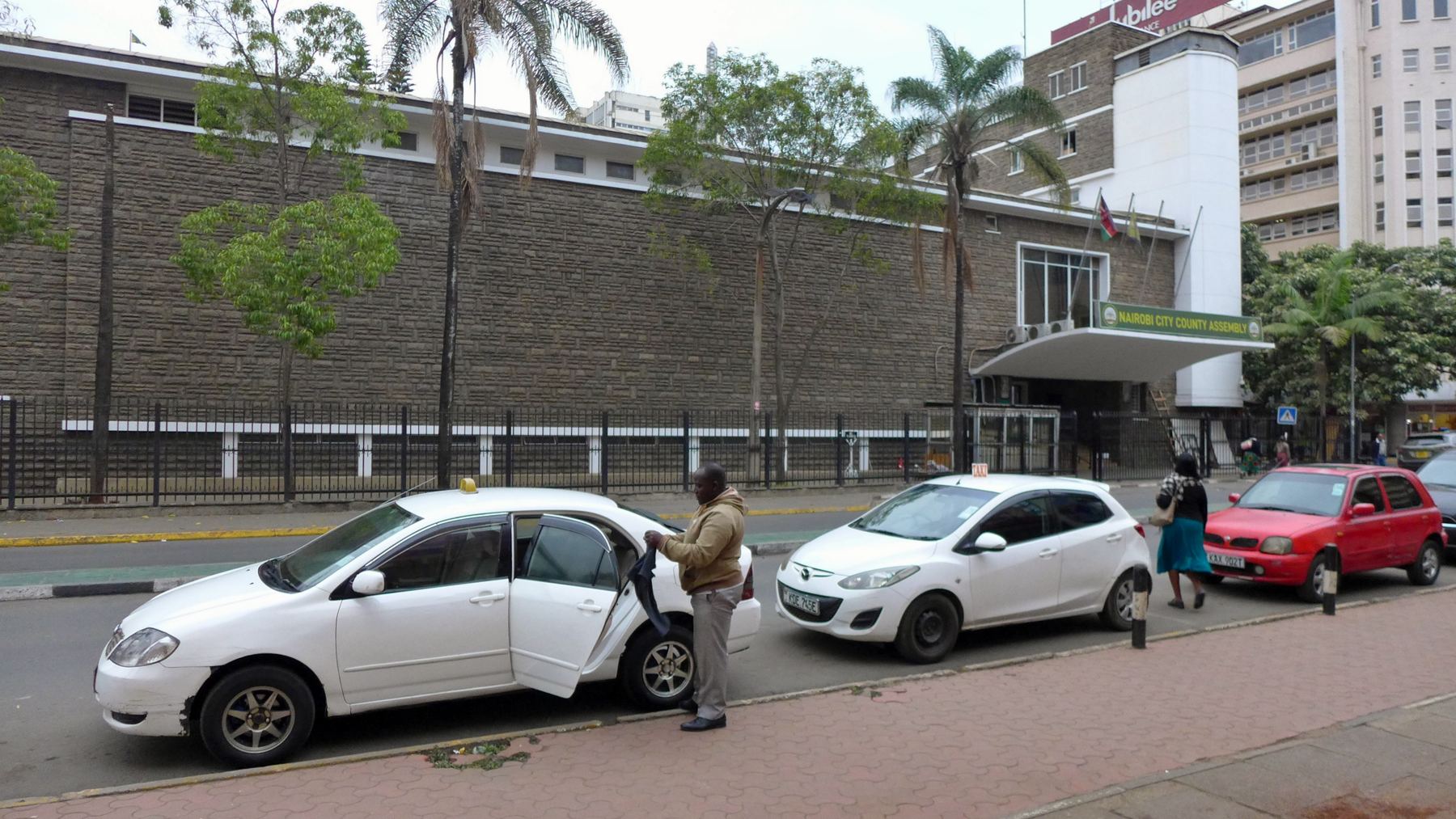 The Nairobi City County Assembly building on a city street