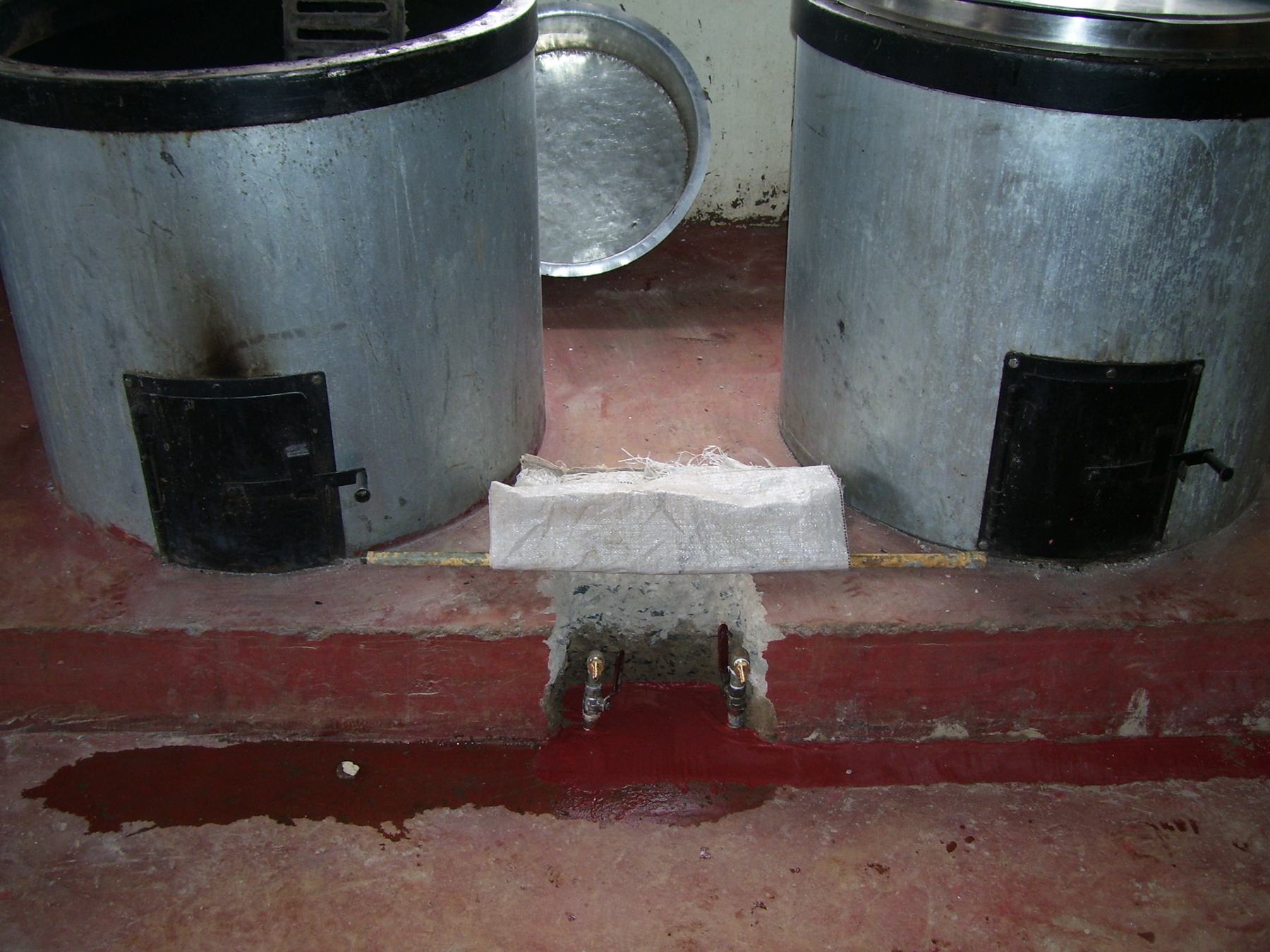 Two improved institutional cookstoves installed in a school kitchen in Kenya